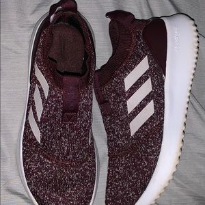 Women’s adidas slip on tennis shoes.